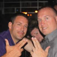 two men throw anchor up